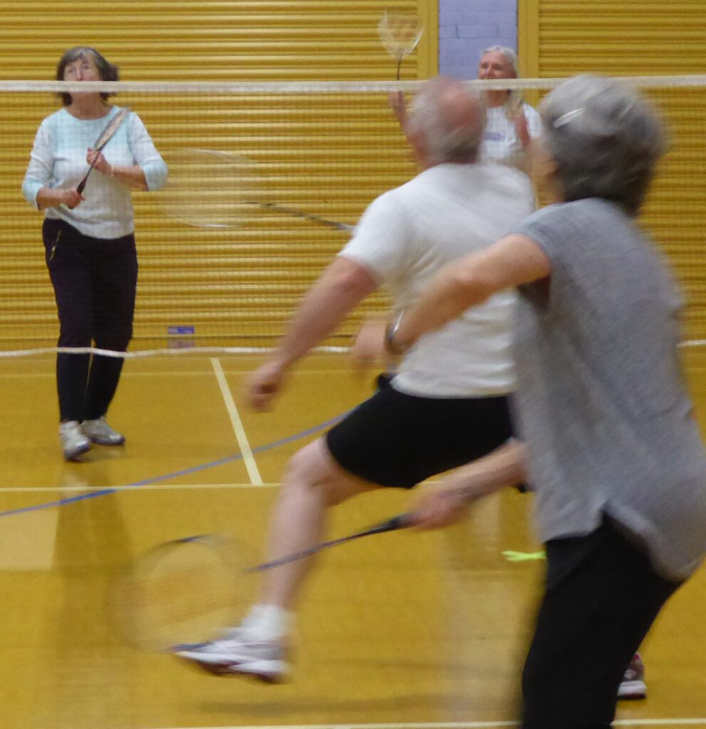 badminton players in action